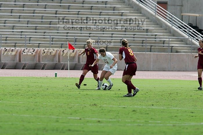 UT junior Stephanie Gibson (#22, Defense and Forward).  The University of Texas women's soccer team won 2-1 against the Iowa State Cyclones Sunday afternoon, October 5, 2008.

Filename: SRM_20081005_12432827.jpg
Aperture: f/5.6
Shutter Speed: 1/2000
Body: Canon EOS-1D Mark II
Lens: Canon EF 300mm f/2.8 L IS