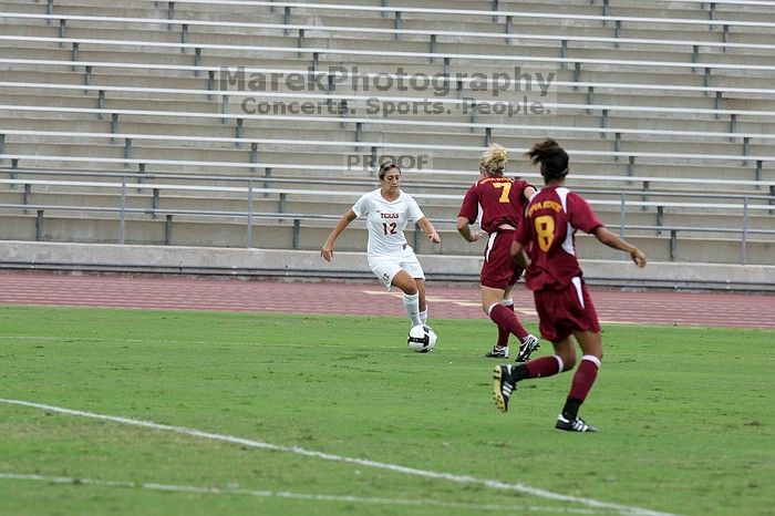 UT sophomore Alisha Ortiz (#12, Forward) in the second half.  The University of Texas women's soccer team won 2-1 against the Iowa State Cyclones Sunday afternoon, October 5, 2008.

Filename: SRM_20081005_13014880.jpg
Aperture: f/5.6
Shutter Speed: 1/1250
Body: Canon EOS-1D Mark II
Lens: Canon EF 300mm f/2.8 L IS