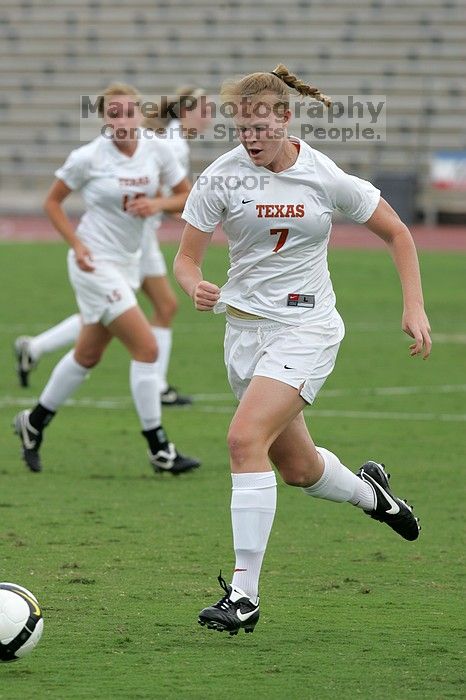 UT freshman Courtney Goodson (#7, Forward and Midfielder) in the second half.  The University of Texas women's soccer team won 2-1 against the Iowa State Cyclones Sunday afternoon, October 5, 2008.

Filename: SRM_20081005_13025413.jpg
Aperture: f/5.6
Shutter Speed: 1/1600
Body: Canon EOS-1D Mark II
Lens: Canon EF 300mm f/2.8 L IS