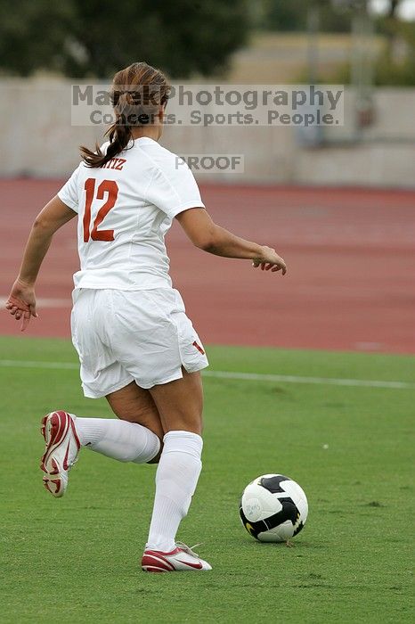 UT sophomore Alisha Ortiz (#12, Forward) in the second half.  The University of Texas women's soccer team won 2-1 against the Iowa State Cyclones Sunday afternoon, October 5, 2008.

Filename: SRM_20081005_13030219.jpg
Aperture: f/5.6
Shutter Speed: 1/1250
Body: Canon EOS-1D Mark II
Lens: Canon EF 300mm f/2.8 L IS