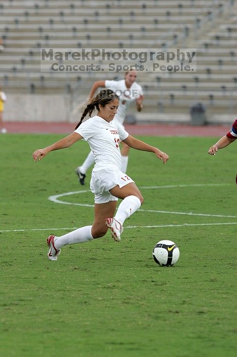 UT sophomore Alisha Ortiz (#12, Forward) in the second half.  The University of Texas women's soccer team won 2-1 against the Iowa State Cyclones Sunday afternoon, October 5, 2008.

Filename: SRM_20081005_13042443.jpg
Aperture: f/5.6
Shutter Speed: 1/1250
Body: Canon EOS-1D Mark II
Lens: Canon EF 300mm f/2.8 L IS