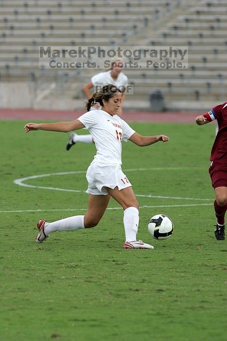 UT sophomore Alisha Ortiz (#12, Forward) in the second half.  The University of Texas women's soccer team won 2-1 against the Iowa State Cyclones Sunday afternoon, October 5, 2008.

Filename: SRM_20081005_13042444.jpg
Aperture: f/5.6
Shutter Speed: 1/1250
Body: Canon EOS-1D Mark II
Lens: Canon EF 300mm f/2.8 L IS