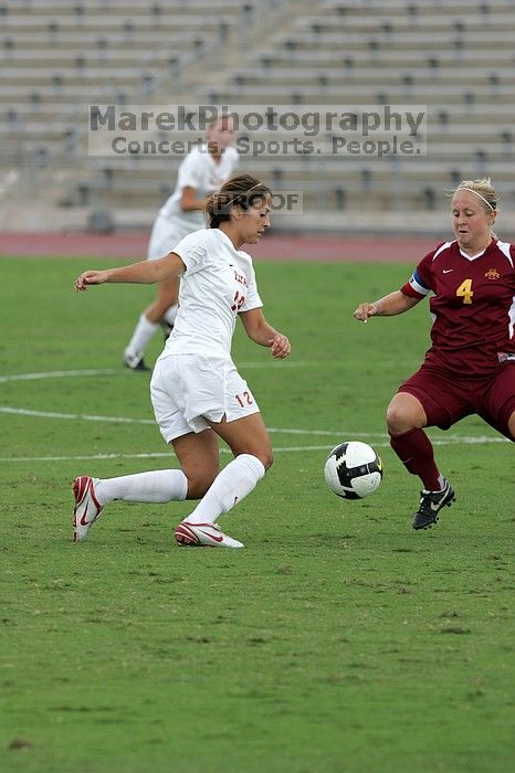 UT sophomore Alisha Ortiz (#12, Forward) in the second half.  The University of Texas women's soccer team won 2-1 against the Iowa State Cyclones Sunday afternoon, October 5, 2008.

Filename: SRM_20081005_13042445.jpg
Aperture: f/5.6
Shutter Speed: 1/1250
Body: Canon EOS-1D Mark II
Lens: Canon EF 300mm f/2.8 L IS