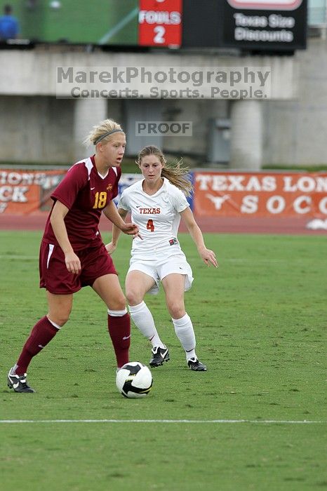 UT senior Jill Gilbeau (#4, Defender and Midfielder) playing defense in the second half.  The University of Texas women's soccer team won 2-1 against the Iowa State Cyclones Sunday afternoon, October 5, 2008.

Filename: SRM_20081005_13042846.jpg
Aperture: f/5.6
Shutter Speed: 1/1000
Body: Canon EOS-1D Mark II
Lens: Canon EF 300mm f/2.8 L IS