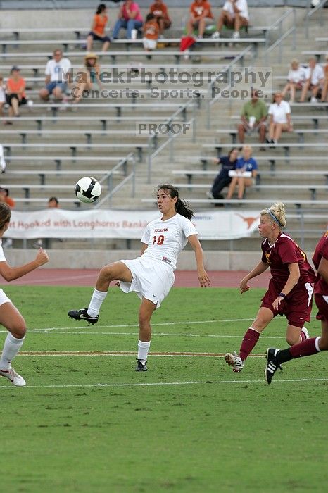 UT senior Stephanie Logterman (#10, Defender) passes the ball in the second half.  The University of Texas women's soccer team won 2-1 against the Iowa State Cyclones Sunday afternoon, October 5, 2008.

Filename: SRM_20081005_13050257.jpg
Aperture: f/5.6
Shutter Speed: 1/1250
Body: Canon EOS-1D Mark II
Lens: Canon EF 300mm f/2.8 L IS