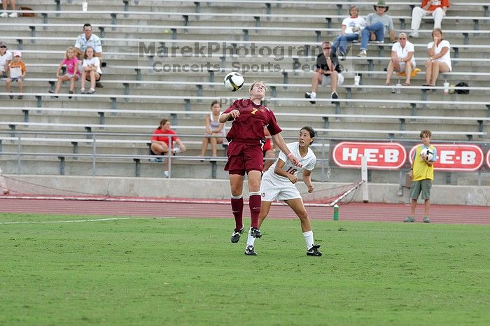 UT senior Stephanie Logterman (#10, Defender) passes the ball in the second half.  The University of Texas women's soccer team won 2-1 against the Iowa State Cyclones Sunday afternoon, October 5, 2008.

Filename: SRM_20081005_13054868.jpg
Aperture: f/5.6
Shutter Speed: 1/800
Body: Canon EOS-1D Mark II
Lens: Canon EF 300mm f/2.8 L IS