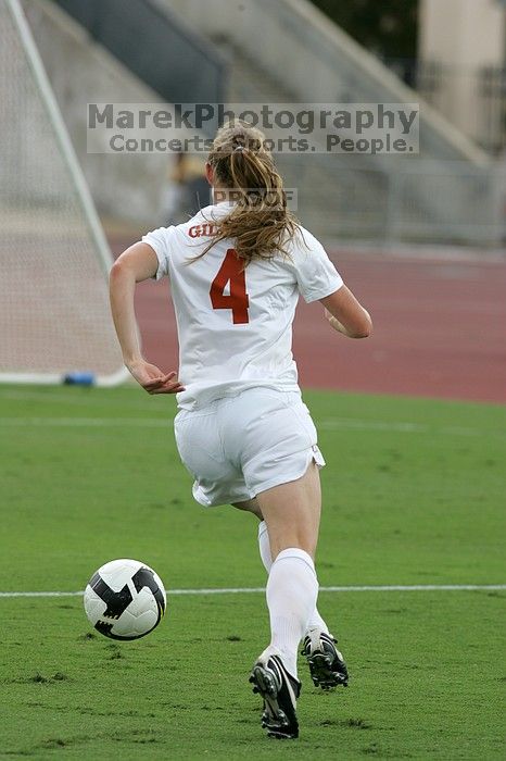 UT senior Jill Gilbeau (#4, Defender and Midfielder) makes a drive and then shot on goal in the second half.  The University of Texas women's soccer team won 2-1 against the Iowa State Cyclones Sunday afternoon, October 5, 2008.

Filename: SRM_20081005_13070076.jpg
Aperture: f/5.6
Shutter Speed: 1/1600
Body: Canon EOS-1D Mark II
Lens: Canon EF 300mm f/2.8 L IS