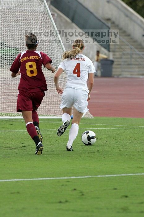 UT senior Jill Gilbeau (#4, Defender and Midfielder) makes a drive and then shot on goal in the second half.  The University of Texas women's soccer team won 2-1 against the Iowa State Cyclones Sunday afternoon, October 5, 2008.

Filename: SRM_20081005_13070484.jpg
Aperture: f/5.6
Shutter Speed: 1/1250
Body: Canon EOS-1D Mark II
Lens: Canon EF 300mm f/2.8 L IS