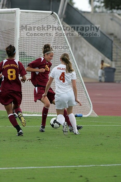 UT senior Jill Gilbeau (#4, Defender and Midfielder) makes a drive and then shot on goal in the second half.  The University of Texas women's soccer team won 2-1 against the Iowa State Cyclones Sunday afternoon, October 5, 2008.

Filename: SRM_20081005_13070487.jpg
Aperture: f/5.6
Shutter Speed: 1/1250
Body: Canon EOS-1D Mark II
Lens: Canon EF 300mm f/2.8 L IS