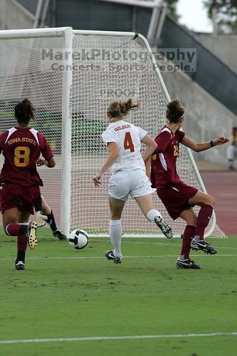 UT senior Jill Gilbeau (#4, Defender and Midfielder) makes a drive and then shot on goal in the second half.  The University of Texas women's soccer team won 2-1 against the Iowa State Cyclones Sunday afternoon, October 5, 2008.

Filename: SRM_20081005_13070689.jpg
Aperture: f/5.6
Shutter Speed: 1/1600
Body: Canon EOS-1D Mark II
Lens: Canon EF 300mm f/2.8 L IS