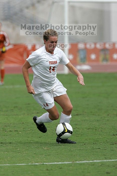 UT senior Kasey Moore (#14, Defender) in the second half.  The University of Texas women's soccer team won 2-1 against the Iowa State Cyclones Sunday afternoon, October 5, 2008.

Filename: SRM_20081005_13092435.jpg
Aperture: f/5.6
Shutter Speed: 1/2000
Body: Canon EOS-1D Mark II
Lens: Canon EF 300mm f/2.8 L IS