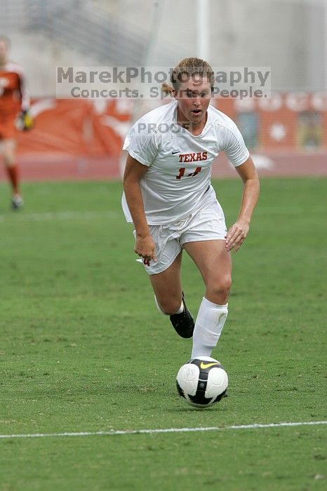 UT senior Kasey Moore (#14, Defender) in the second half.  The University of Texas women's soccer team won 2-1 against the Iowa State Cyclones Sunday afternoon, October 5, 2008.

Filename: SRM_20081005_13092637.jpg
Aperture: f/5.6
Shutter Speed: 1/1600
Body: Canon EOS-1D Mark II
Lens: Canon EF 300mm f/2.8 L IS