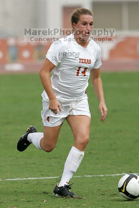 UT senior Kasey Moore (#14, Defender) in the second half.  The University of Texas women's soccer team won 2-1 against the Iowa State Cyclones Sunday afternoon, October 5, 2008.

Filename: SRM_20081005_13092844.jpg
Aperture: f/5.6
Shutter Speed: 1/2000
Body: Canon EOS-1D Mark II
Lens: Canon EF 300mm f/2.8 L IS