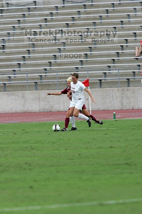 UT senior Kasey Moore (#14, Defender) in the second half.  The University of Texas women's soccer team won 2-1 against the Iowa State Cyclones Sunday afternoon, October 5, 2008.

Filename: SRM_20081005_13122274.jpg
Aperture: f/5.6
Shutter Speed: 1/1250
Body: Canon EOS-1D Mark II
Lens: Canon EF 300mm f/2.8 L IS