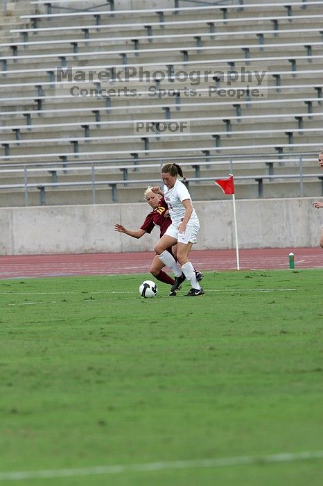 UT senior Kasey Moore (#14, Defender) in the second half.  The University of Texas women's soccer team won 2-1 against the Iowa State Cyclones Sunday afternoon, October 5, 2008.

Filename: SRM_20081005_13122275.jpg
Aperture: f/5.6
Shutter Speed: 1/1250
Body: Canon EOS-1D Mark II
Lens: Canon EF 300mm f/2.8 L IS