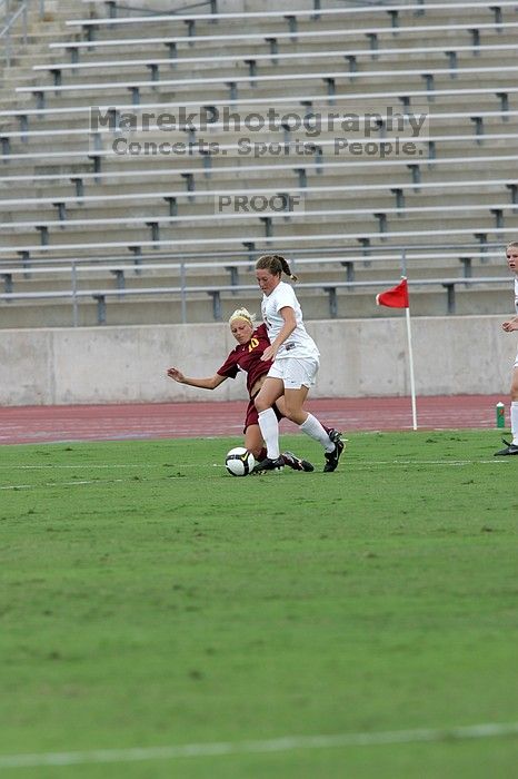 UT senior Kasey Moore (#14, Defender) in the second half.  The University of Texas women's soccer team won 2-1 against the Iowa State Cyclones Sunday afternoon, October 5, 2008.

Filename: SRM_20081005_13122276.jpg
Aperture: f/5.6
Shutter Speed: 1/1250
Body: Canon EOS-1D Mark II
Lens: Canon EF 300mm f/2.8 L IS