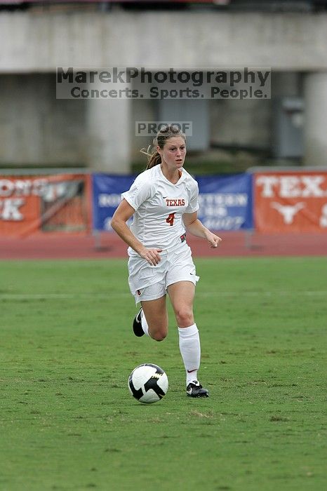 UT senior Jill Gilbeau (#4, Defender and Midfielder) dribbles the ball in the second half.  The University of Texas women's soccer team won 2-1 against the Iowa State Cyclones Sunday afternoon, October 5, 2008.

Filename: SRM_20081005_13145803.jpg
Aperture: f/5.6
Shutter Speed: 1/1250
Body: Canon EOS-1D Mark II
Lens: Canon EF 300mm f/2.8 L IS