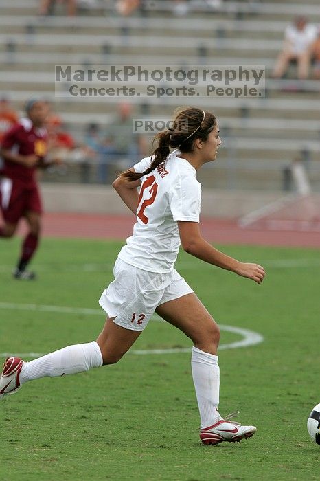 UT sophomore Alisha Ortiz (#12, Forward) in the second half.  The University of Texas women's soccer team won 2-1 against the Iowa State Cyclones Sunday afternoon, October 5, 2008.

Filename: SRM_20081005_13150410.jpg
Aperture: f/5.6
Shutter Speed: 1/1250
Body: Canon EOS-1D Mark II
Lens: Canon EF 300mm f/2.8 L IS