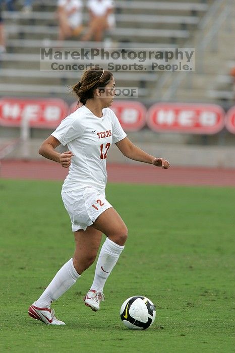 UT sophomore Alisha Ortiz (#12, Forward) in the second half.  The University of Texas women's soccer team won 2-1 against the Iowa State Cyclones Sunday afternoon, October 5, 2008.

Filename: SRM_20081005_13150613.jpg
Aperture: f/5.6
Shutter Speed: 1/1250
Body: Canon EOS-1D Mark II
Lens: Canon EF 300mm f/2.8 L IS