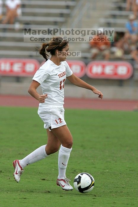 UT sophomore Alisha Ortiz (#12, Forward) in the second half.  The University of Texas women's soccer team won 2-1 against the Iowa State Cyclones Sunday afternoon, October 5, 2008.

Filename: SRM_20081005_13150614.jpg
Aperture: f/5.6
Shutter Speed: 1/1250
Body: Canon EOS-1D Mark II
Lens: Canon EF 300mm f/2.8 L IS