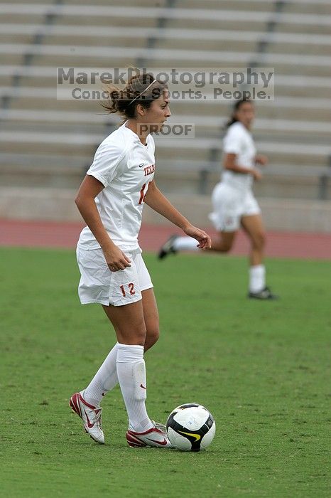 UT sophomore Alisha Ortiz (#12, Forward) in the second half.  The University of Texas women's soccer team won 2-1 against the Iowa State Cyclones Sunday afternoon, October 5, 2008.

Filename: SRM_20081005_13150819.jpg
Aperture: f/5.6
Shutter Speed: 1/1250
Body: Canon EOS-1D Mark II
Lens: Canon EF 300mm f/2.8 L IS