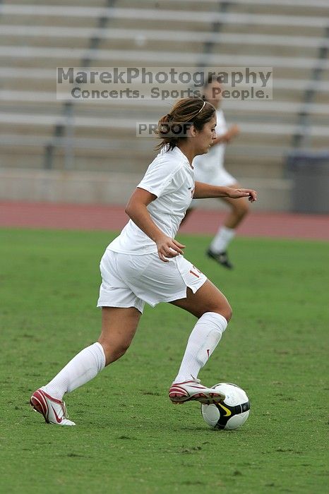 UT sophomore Alisha Ortiz (#12, Forward) in the second half.  The University of Texas women's soccer team won 2-1 against the Iowa State Cyclones Sunday afternoon, October 5, 2008.

Filename: SRM_20081005_13150821.jpg
Aperture: f/5.6
Shutter Speed: 1/1250
Body: Canon EOS-1D Mark II
Lens: Canon EF 300mm f/2.8 L IS