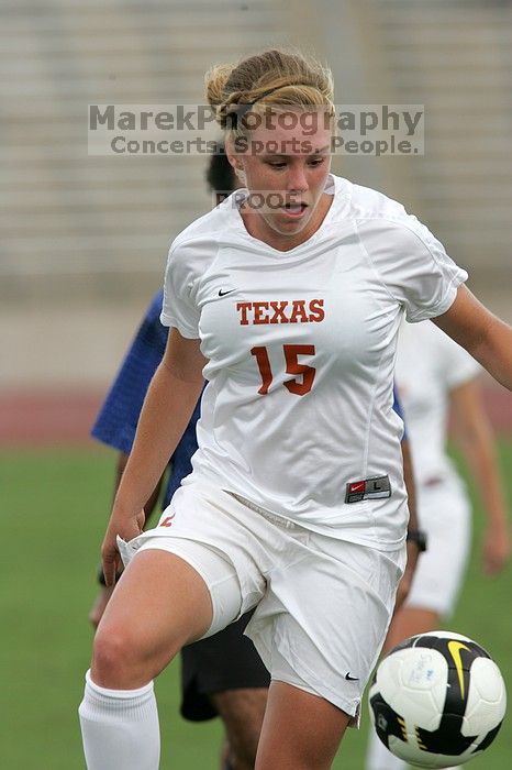 UT freshman Kylie Doniak (#15, Midfielder) in the second half.  The University of Texas women's soccer team won 2-1 against the Iowa State Cyclones Sunday afternoon, October 5, 2008.

Filename: SRM_20081005_13164238.jpg
Aperture: f/5.6
Shutter Speed: 1/1600
Body: Canon EOS-1D Mark II
Lens: Canon EF 300mm f/2.8 L IS