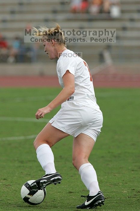 UT freshman Courtney Goodson (#7, Forward and Midfielder) in the second half.  The University of Texas women's soccer team won 2-1 against the Iowa State Cyclones Sunday afternoon, October 5, 2008.

Filename: SRM_20081005_13173244.jpg
Aperture: f/5.6
Shutter Speed: 1/1600
Body: Canon EOS-1D Mark II
Lens: Canon EF 300mm f/2.8 L IS