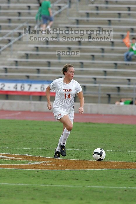 UT senior Kasey Moore (#14, Defender) takes the ball upfield in the second half.  The University of Texas women's soccer team won 2-1 against the Iowa State Cyclones Sunday afternoon, October 5, 2008.

Filename: SRM_20081005_13174653.jpg
Aperture: f/5.6
Shutter Speed: 1/1250
Body: Canon EOS-1D Mark II
Lens: Canon EF 300mm f/2.8 L IS