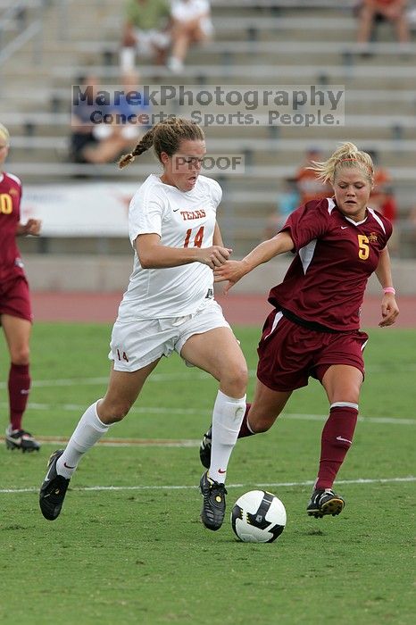 UT senior Kasey Moore (#14, Defender) takes the ball upfield in the second half.  The University of Texas women's soccer team won 2-1 against the Iowa State Cyclones Sunday afternoon, October 5, 2008.

Filename: SRM_20081005_13175469.jpg
Aperture: f/5.6
Shutter Speed: 1/1250
Body: Canon EOS-1D Mark II
Lens: Canon EF 300mm f/2.8 L IS