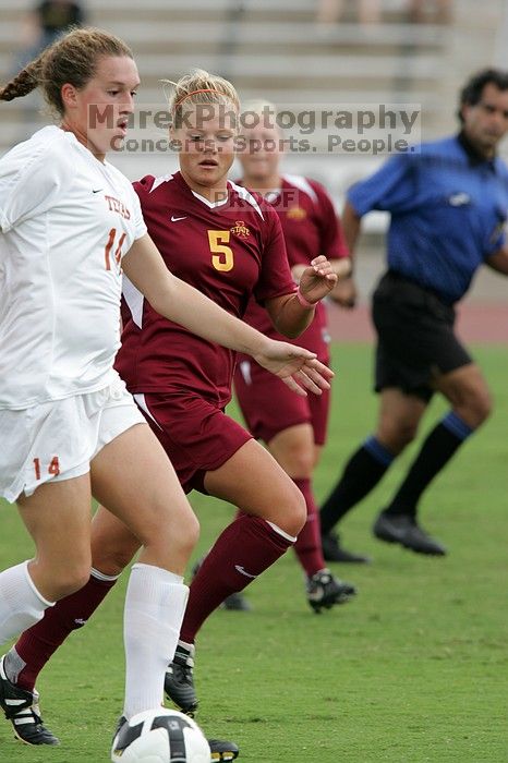 UT senior Kasey Moore (#14, Defender) takes the ball upfield in the second half.  The University of Texas women's soccer team won 2-1 against the Iowa State Cyclones Sunday afternoon, October 5, 2008.

Filename: SRM_20081005_13175883.jpg
Aperture: f/5.6
Shutter Speed: 1/1000
Body: Canon EOS-1D Mark II
Lens: Canon EF 300mm f/2.8 L IS