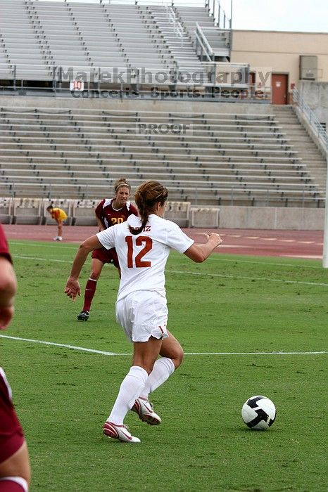 UT sophomore Alisha Ortiz (#12, Forward) in the second half.  The University of Texas women's soccer team won 2-1 against the Iowa State Cyclones Sunday afternoon, October 5, 2008.

Filename: SRM_20081005_13184482.jpg
Aperture: f/5.6
Shutter Speed: 1/1000
Body: Canon EOS 20D
Lens: Canon EF 80-200mm f/2.8 L