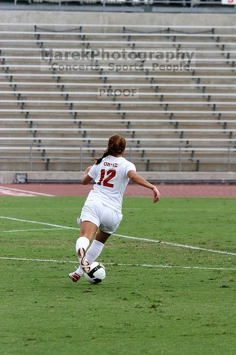 UT sophomore Alisha Ortiz (#12, Forward) in the second half.  The University of Texas women's soccer team won 2-1 against the Iowa State Cyclones Sunday afternoon, October 5, 2008.

Filename: SRM_20081005_13185288.jpg
Aperture: f/5.6
Shutter Speed: 1/1000
Body: Canon EOS 20D
Lens: Canon EF 80-200mm f/2.8 L