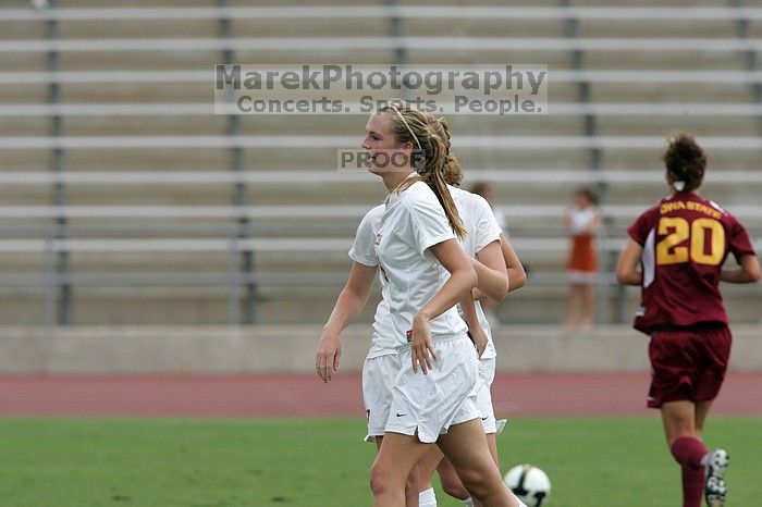 UT freshman Courtney Goodson (#7, Forward and Midfielder) congratulates UT freshman Lucy Keith (#6, Midfielder) on her goal in the second half.  The University of Texas women's soccer team won 2-1 against the Iowa State Cyclones Sunday afternoon, October 5, 2008.

Filename: SRM_20081005_13190009.jpg
Aperture: f/5.6
Shutter Speed: 1/1600
Body: Canon EOS-1D Mark II
Lens: Canon EF 300mm f/2.8 L IS