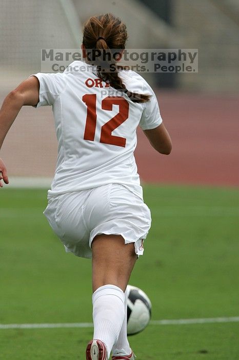 UT sophomore Alisha Ortiz (#12, Forward) in the second half.  The University of Texas women's soccer team won 2-1 against the Iowa State Cyclones Sunday afternoon, October 5, 2008.

Filename: SRM_20081005_13210872.jpg
Aperture: f/5.6
Shutter Speed: 1/2500
Body: Canon EOS-1D Mark II
Lens: Canon EF 300mm f/2.8 L IS