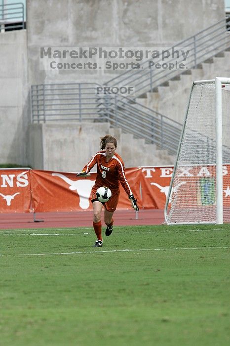 UT senior Dianna Pfenninger (#8, Goalkeeper) punts the ball in the second half.  The University of Texas women's soccer team won 2-1 against the Iowa State Cyclones Sunday afternoon, October 5, 2008.

Filename: SRM_20081005_13225693.jpg
Aperture: f/5.6
Shutter Speed: 1/2000
Body: Canon EOS-1D Mark II
Lens: Canon EF 300mm f/2.8 L IS