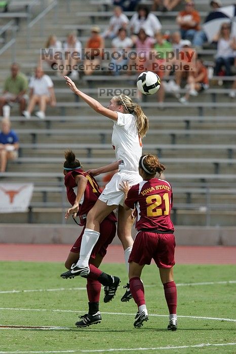 UT freshman Lucy Keith (#6, Midfielder) with the header in the second half.  The University of Texas women's soccer team won 2-1 against the Iowa State Cyclones Sunday afternoon, October 5, 2008.

Filename: SRM_20081005_13230099.jpg
Aperture: f/5.6
Shutter Speed: 1/2500
Body: Canon EOS-1D Mark II
Lens: Canon EF 300mm f/2.8 L IS