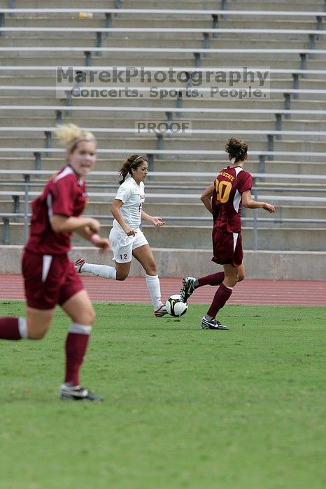 UT sophomore Alisha Ortiz (#12, Forward) in the second half.  The University of Texas women's soccer team won 2-1 against the Iowa State Cyclones Sunday afternoon, October 5, 2008.

Filename: SRM_20081005_13231407.jpg
Aperture: f/5.6
Shutter Speed: 1/1600
Body: Canon EOS-1D Mark II
Lens: Canon EF 300mm f/2.8 L IS