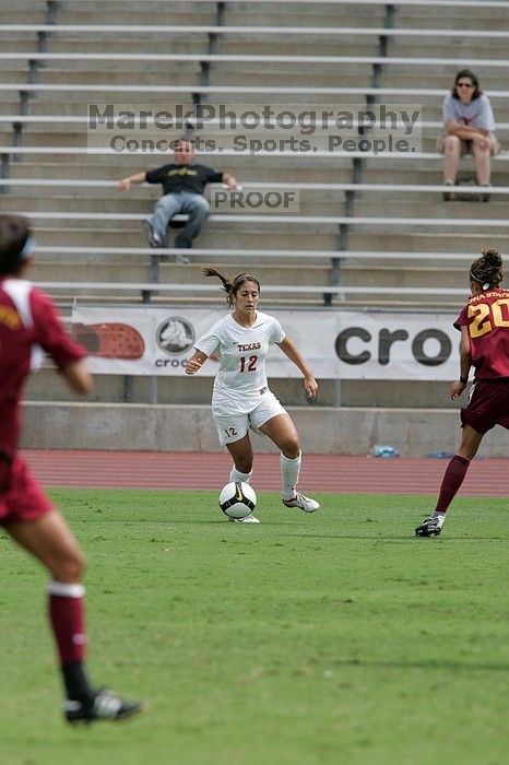 UT sophomore Alisha Ortiz (#12, Forward) in the second half.  The University of Texas women's soccer team won 2-1 against the Iowa State Cyclones Sunday afternoon, October 5, 2008.

Filename: SRM_20081005_13231611.jpg
Aperture: f/5.6
Shutter Speed: 1/2000
Body: Canon EOS-1D Mark II
Lens: Canon EF 300mm f/2.8 L IS