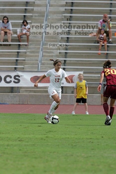 UT sophomore Alisha Ortiz (#12, Forward) in the second half.  The University of Texas women's soccer team won 2-1 against the Iowa State Cyclones Sunday afternoon, October 5, 2008.

Filename: SRM_20081005_13231612.jpg
Aperture: f/5.6
Shutter Speed: 1/2000
Body: Canon EOS-1D Mark II
Lens: Canon EF 300mm f/2.8 L IS