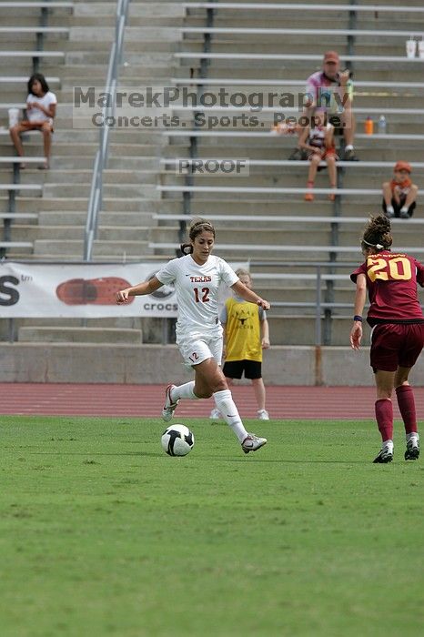 UT sophomore Alisha Ortiz (#12, Forward) in the second half.  The University of Texas women's soccer team won 2-1 against the Iowa State Cyclones Sunday afternoon, October 5, 2008.

Filename: SRM_20081005_13231613.jpg
Aperture: f/5.6
Shutter Speed: 1/2000
Body: Canon EOS-1D Mark II
Lens: Canon EF 300mm f/2.8 L IS