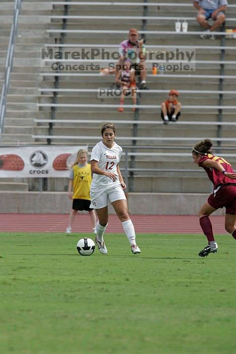 UT sophomore Alisha Ortiz (#12, Forward) in the second half.  The University of Texas women's soccer team won 2-1 against the Iowa State Cyclones Sunday afternoon, October 5, 2008.

Filename: SRM_20081005_13231814.jpg
Aperture: f/5.6
Shutter Speed: 1/2000
Body: Canon EOS-1D Mark II
Lens: Canon EF 300mm f/2.8 L IS