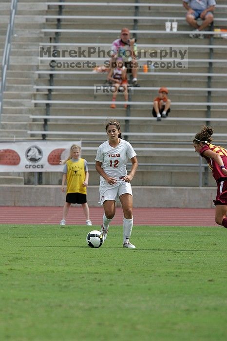 UT sophomore Alisha Ortiz (#12, Forward) in the second half.  The University of Texas women's soccer team won 2-1 against the Iowa State Cyclones Sunday afternoon, October 5, 2008.

Filename: SRM_20081005_13231815.jpg
Aperture: f/5.6
Shutter Speed: 1/2000
Body: Canon EOS-1D Mark II
Lens: Canon EF 300mm f/2.8 L IS