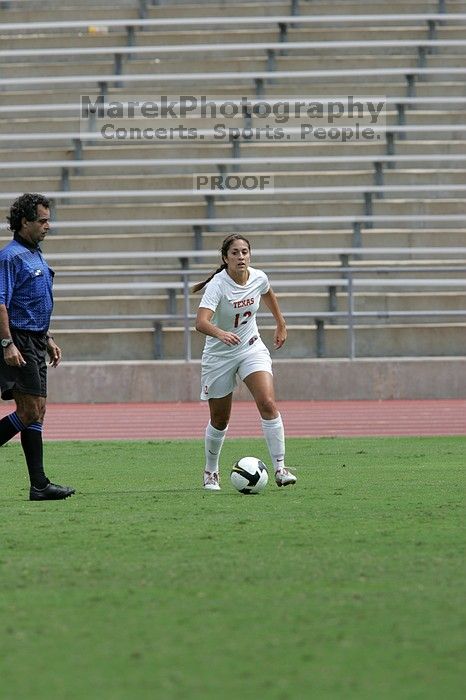 UT sophomore Alisha Ortiz (#12, Forward) in the second half.  The University of Texas women's soccer team won 2-1 against the Iowa State Cyclones Sunday afternoon, October 5, 2008.

Filename: SRM_20081005_13232825.jpg
Aperture: f/5.6
Shutter Speed: 1/2000
Body: Canon EOS-1D Mark II
Lens: Canon EF 300mm f/2.8 L IS