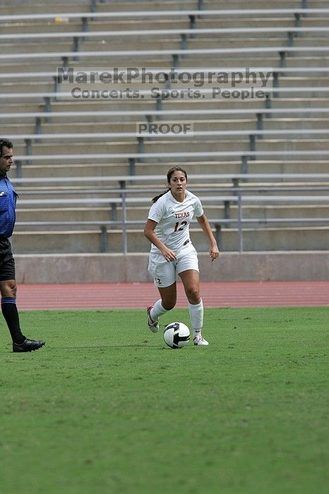 UT sophomore Alisha Ortiz (#12, Forward) in the second half.  The University of Texas women's soccer team won 2-1 against the Iowa State Cyclones Sunday afternoon, October 5, 2008.

Filename: SRM_20081005_13232826.jpg
Aperture: f/5.6
Shutter Speed: 1/2000
Body: Canon EOS-1D Mark II
Lens: Canon EF 300mm f/2.8 L IS