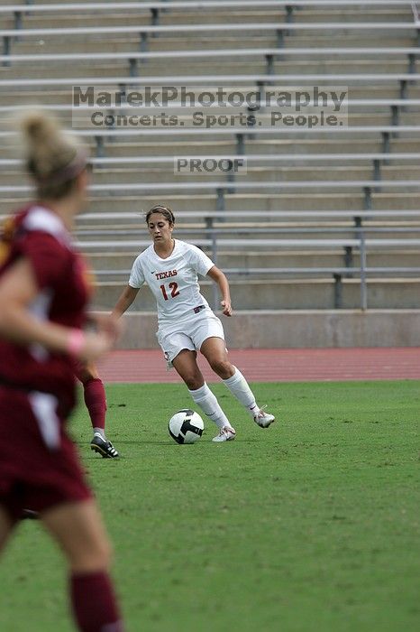 UT sophomore Alisha Ortiz (#12, Forward) in the second half.  The University of Texas women's soccer team won 2-1 against the Iowa State Cyclones Sunday afternoon, October 5, 2008.

Filename: SRM_20081005_13232827.jpg
Aperture: f/5.6
Shutter Speed: 1/2000
Body: Canon EOS-1D Mark II
Lens: Canon EF 300mm f/2.8 L IS