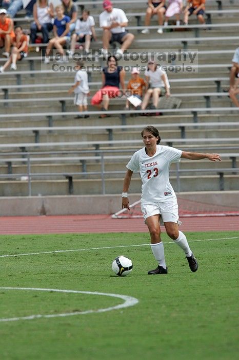 UT senior Courtney Gaines (#23, Midfielder) in the second half.  The University of Texas women's soccer team won 2-1 against the Iowa State Cyclones Sunday afternoon, October 5, 2008.

Filename: SRM_20081005_13233229.jpg
Aperture: f/5.6
Shutter Speed: 1/2000
Body: Canon EOS-1D Mark II
Lens: Canon EF 300mm f/2.8 L IS