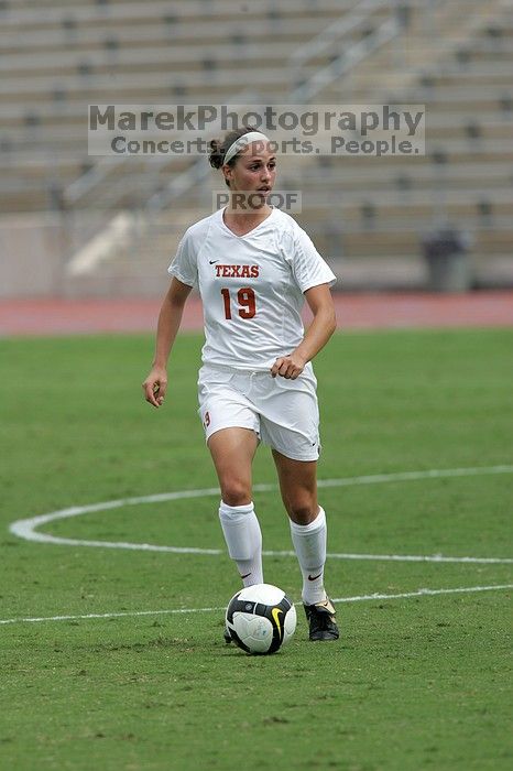 UT sophomore Erica Campanelli (#19, Defender) in the second half.  The University of Texas women's soccer team won 2-1 against the Iowa State Cyclones Sunday afternoon, October 5, 2008.

Filename: SRM_20081005_13233636.jpg
Aperture: f/5.6
Shutter Speed: 1/2000
Body: Canon EOS-1D Mark II
Lens: Canon EF 300mm f/2.8 L IS