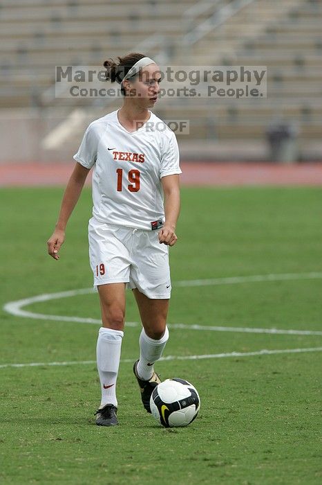 UT sophomore Erica Campanelli (#19, Defender) in the second half.  The University of Texas women's soccer team won 2-1 against the Iowa State Cyclones Sunday afternoon, October 5, 2008.

Filename: SRM_20081005_13233639.jpg
Aperture: f/5.6
Shutter Speed: 1/2000
Body: Canon EOS-1D Mark II
Lens: Canon EF 300mm f/2.8 L IS