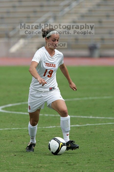 UT sophomore Erica Campanelli (#19, Defender) in the second half.  The University of Texas women's soccer team won 2-1 against the Iowa State Cyclones Sunday afternoon, October 5, 2008.

Filename: SRM_20081005_13233841.jpg
Aperture: f/5.6
Shutter Speed: 1/2000
Body: Canon EOS-1D Mark II
Lens: Canon EF 300mm f/2.8 L IS